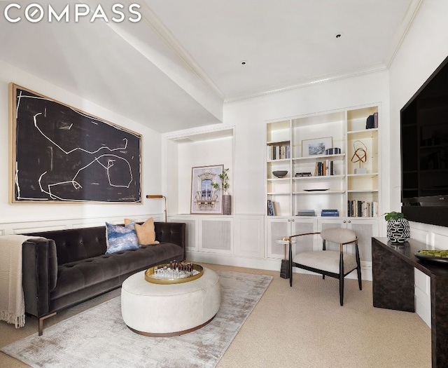 living room featuring crown molding, carpet flooring, and built in features