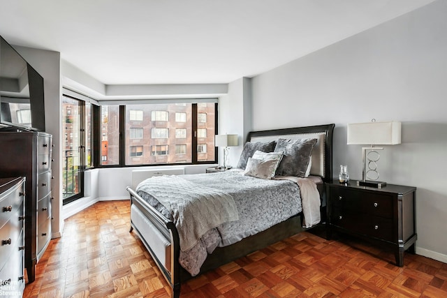 bedroom featuring baseboards