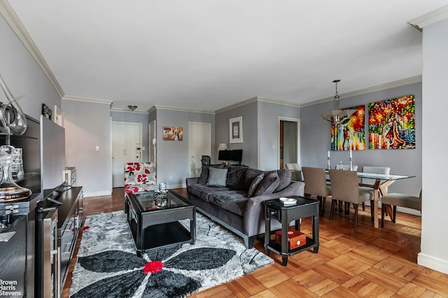 living room with crown molding and baseboards