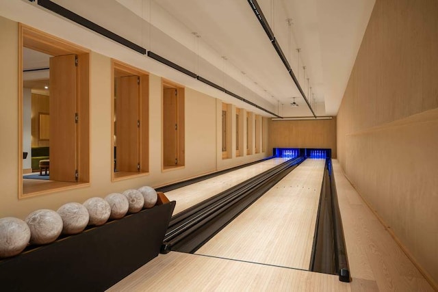 playroom with hardwood / wood-style flooring and bowling