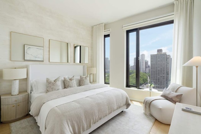 bedroom with light hardwood / wood-style flooring