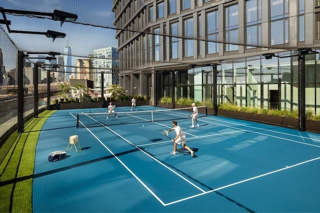 view of tennis court with basketball court