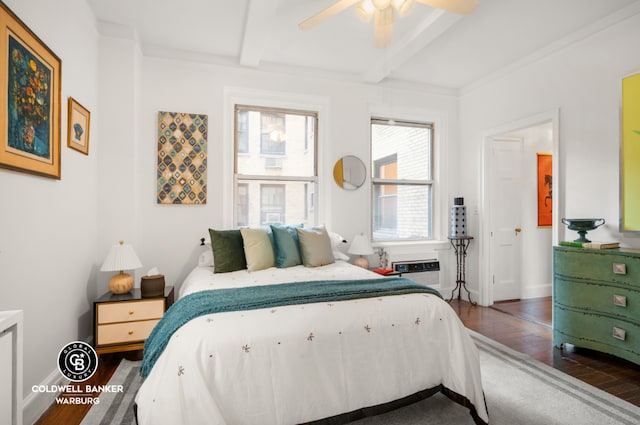 bedroom with ceiling fan, multiple windows, dark hardwood / wood-style floors, and beam ceiling