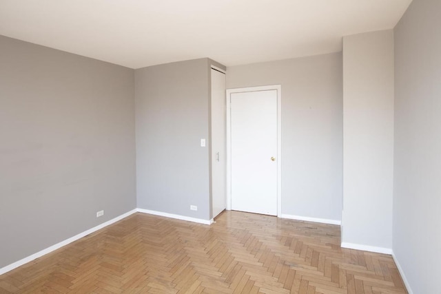 empty room featuring light parquet flooring