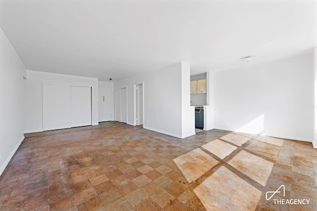 185 W End Ave Unit 25H, New York City, NY 10023 - unfurnished room with baseboards