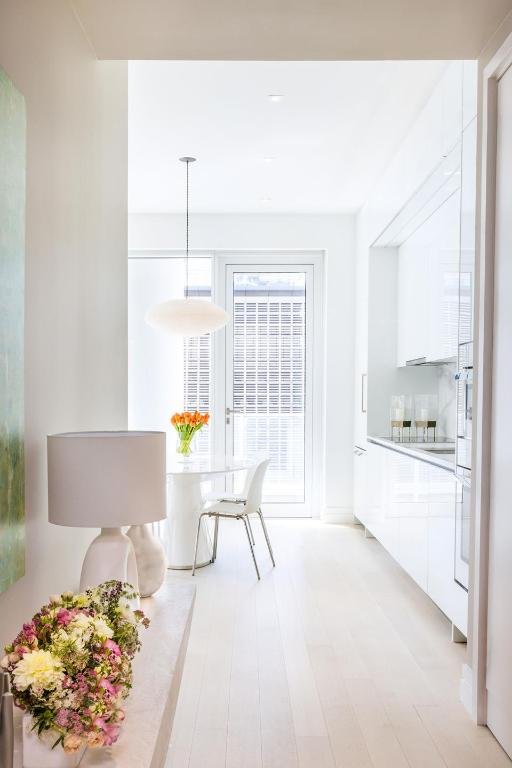 unfurnished dining area with light wood-type flooring