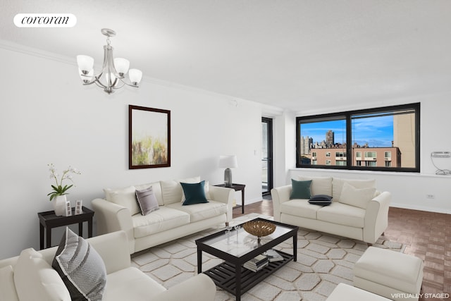 living room featuring visible vents, baseboards, ornamental molding, wood finished floors, and a notable chandelier