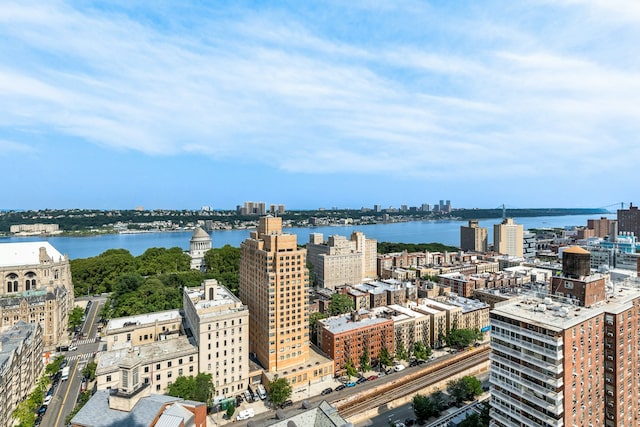 drone / aerial view with a view of city and a water view