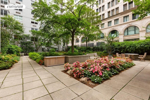 surrounding community featuring a patio area