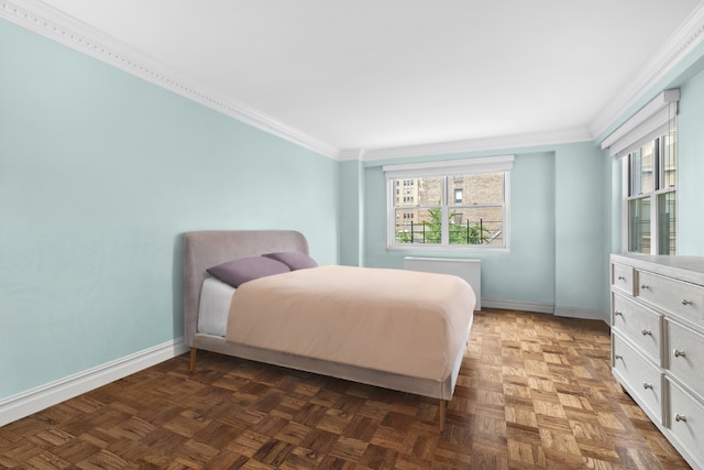 bedroom with crown molding, dark parquet floors, and multiple windows