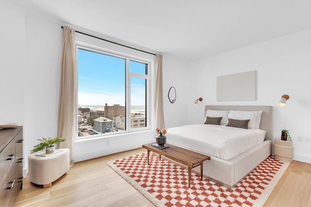 bedroom featuring wood finished floors