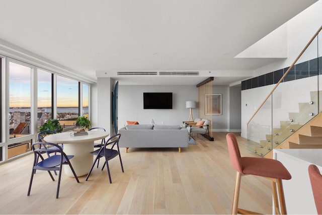 dining space featuring light hardwood / wood-style floors