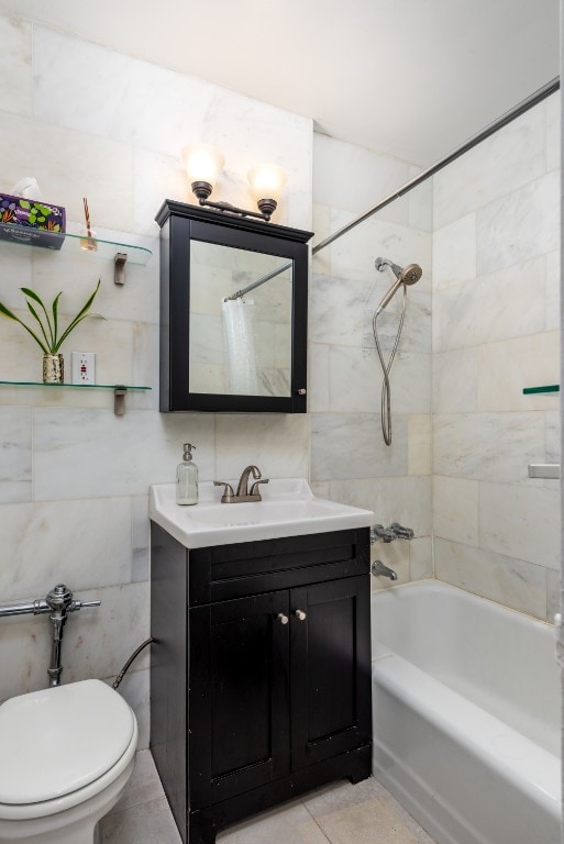 full bathroom featuring toilet, tile walls, shower / bath combo, and vanity