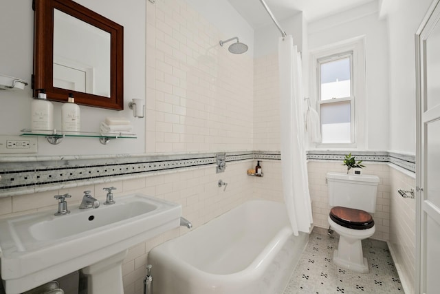 111 E 75th St Phb, Phb, New York City, NY 10021 - bathroom with tile walls, shower / bath combo, and wainscoting