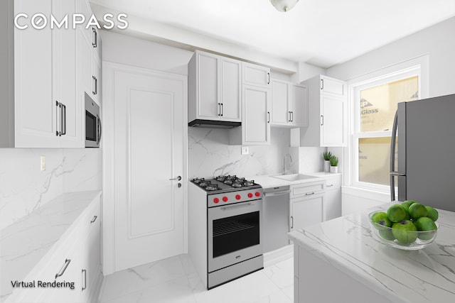 kitchen featuring a sink, light stone countertops, marble finish floor, and stainless steel appliances