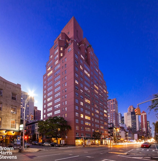 view of building exterior featuring a city view