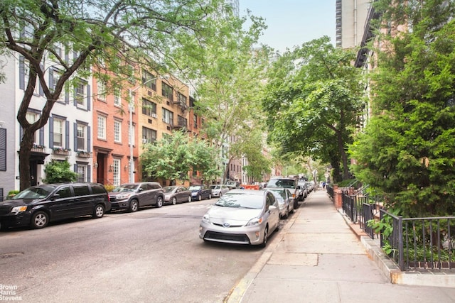 view of road featuring curbs and sidewalks