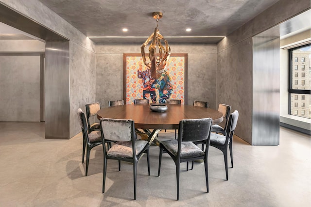 dining room featuring finished concrete flooring