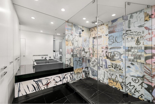 bathroom featuring recessed lighting, a shower stall, and vanity