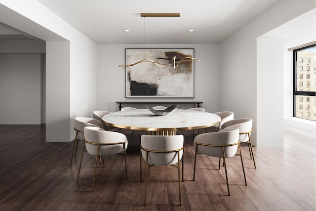 dining room featuring recessed lighting and wood finished floors