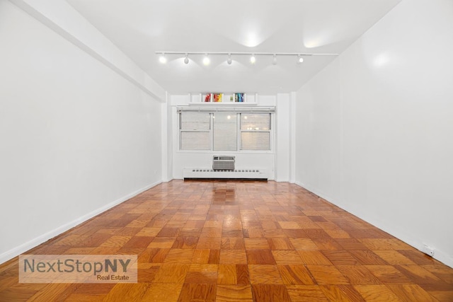 empty room with baseboards