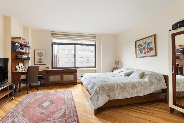 bedroom featuring light hardwood / wood-style floors