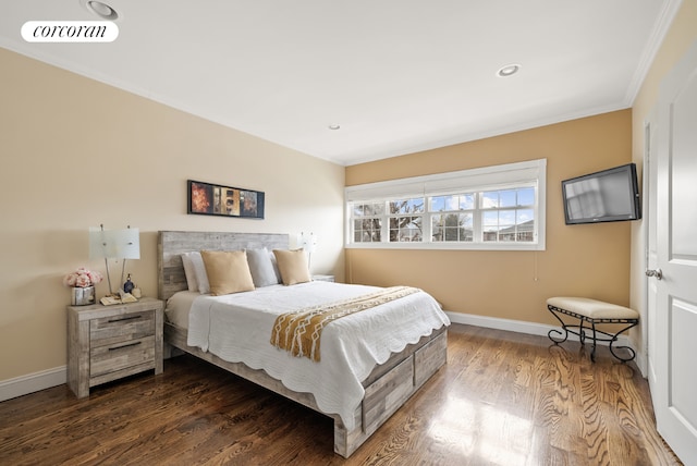 bedroom featuring crown molding and dark hardwood / wood-style floors