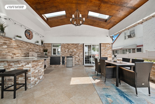 view of patio featuring an outdoor bar and an outdoor kitchen