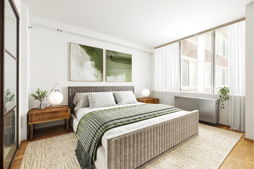 bedroom featuring light hardwood / wood-style floors