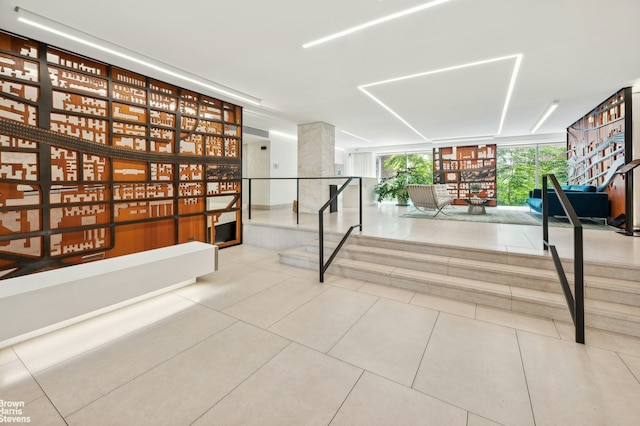 hallway with tile patterned floors