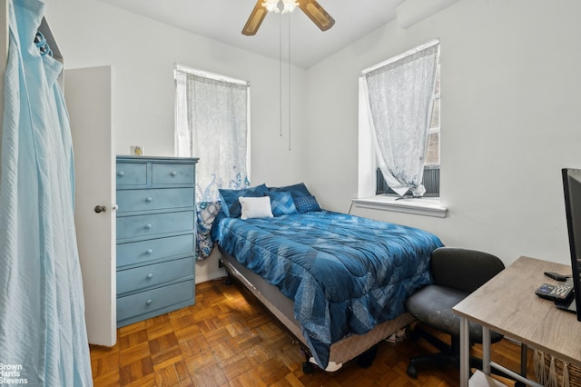 bedroom featuring ceiling fan