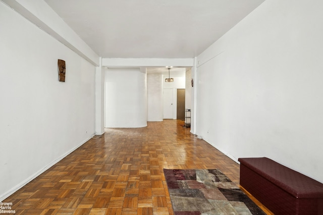 interior space featuring baseboards