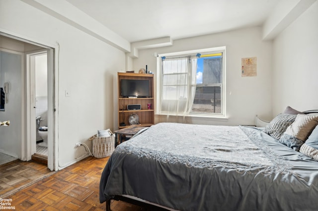 bedroom with baseboards