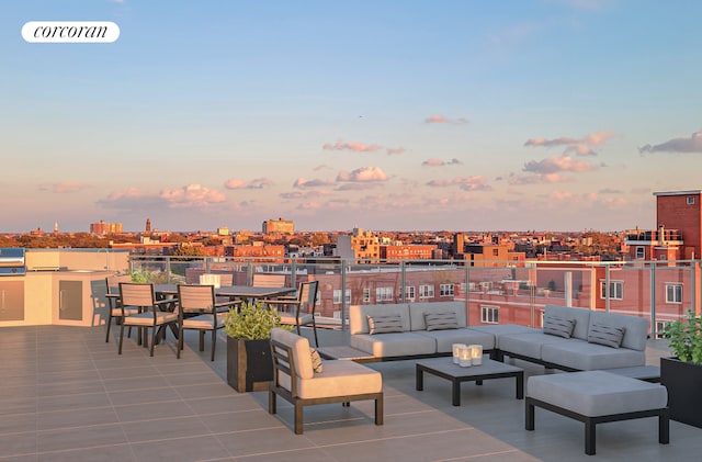 exterior space featuring a city view and an outdoor hangout area