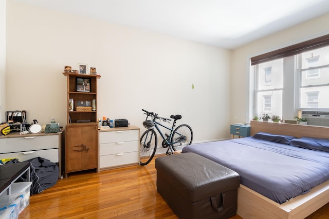 bedroom with light wood-style floors