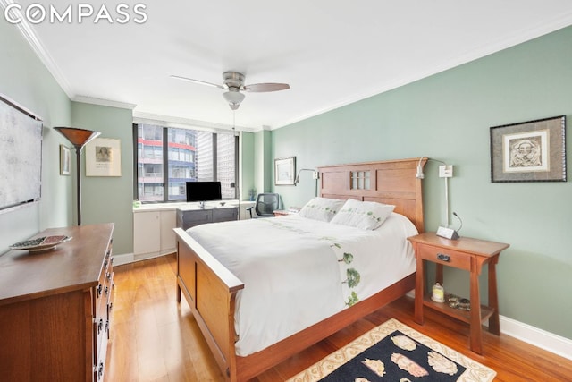 bedroom featuring ceiling fan, light hardwood / wood-style flooring, and ornamental molding