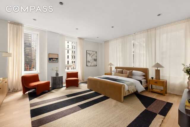 114 Liberty St Unit 7, New York City, NY 10006 - bedroom with light wood finished floors