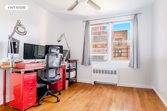 4 Bogardus Pl Unit 3E, New York City, NY 10040 - office space with radiator, wood finished floors, baseboards, and cooling unit