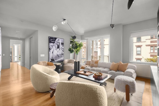 living room with light hardwood / wood-style flooring