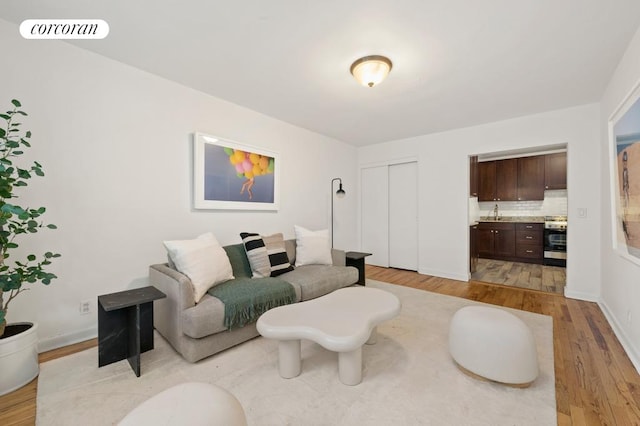 240 E 30th St Unit 3A, New York City, NY 10016 - living area with light wood finished floors and baseboards