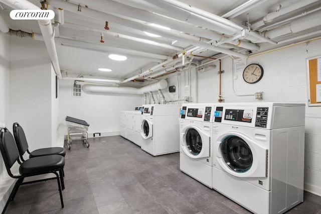 240 E 30th St Unit 3A, New York City, NY 10016 - community laundry room with washing machine and dryer and tile patterned floors