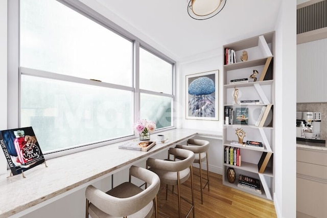 home office with light wood-type flooring