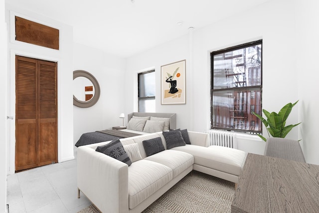 bedroom featuring radiator