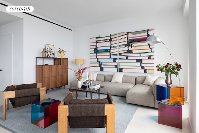 carpeted living area with visible vents