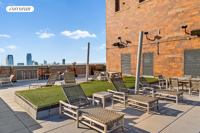 view of patio / terrace with a city view