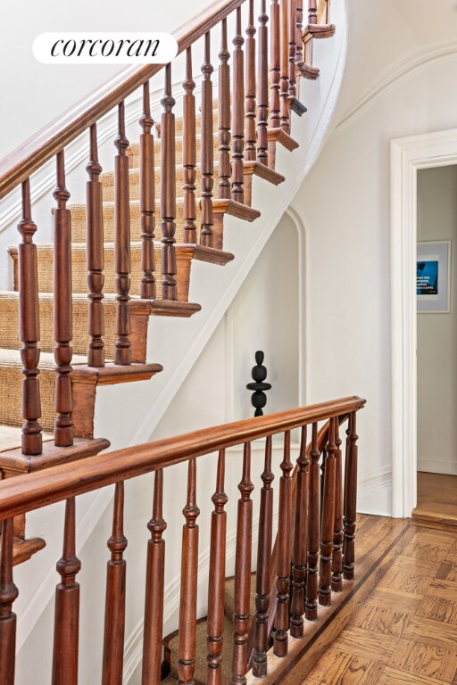 stairway with parquet floors