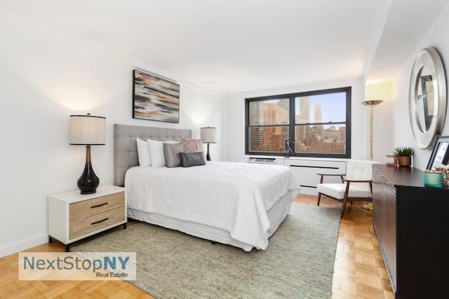 bedroom featuring parquet floors