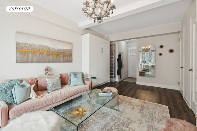 living area with beam ceiling, visible vents, wood finished floors, a chandelier, and baseboards