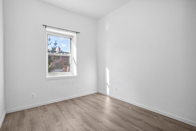 bedroom with hardwood / wood-style floors