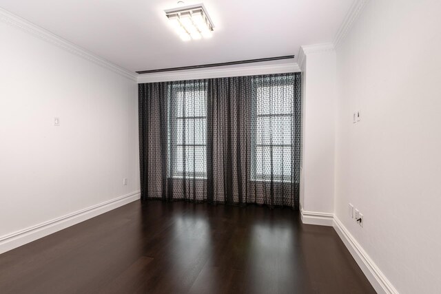 bedroom with crown molding and hardwood / wood-style flooring